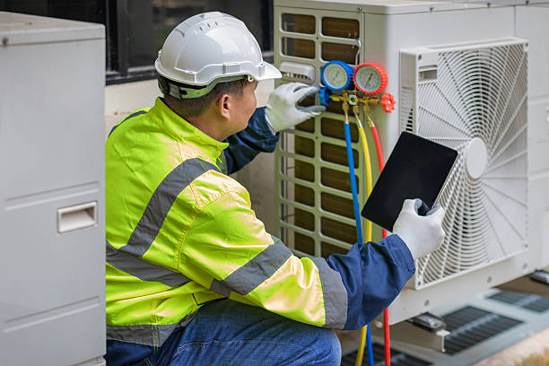 Professional Ac Installation technician working in Garden City, NY